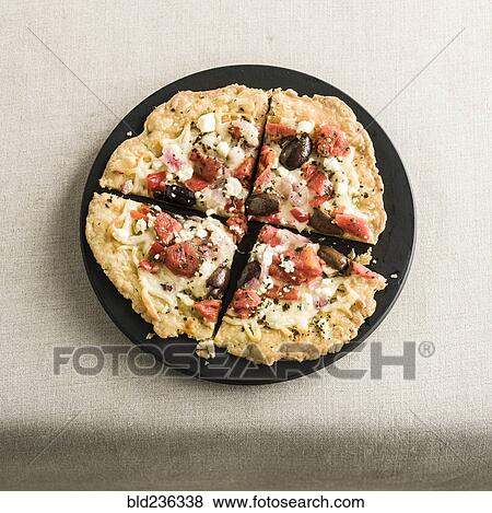 Stock Photo - Slices of parmesan crisp. Fotosearch