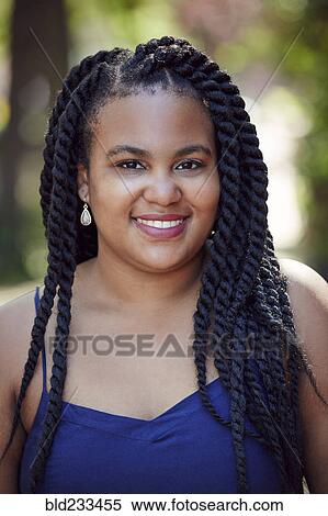 Smiling black woman with braids View Large Photo Image Stock Photography - Smiling black woman with braids. Fotosearch