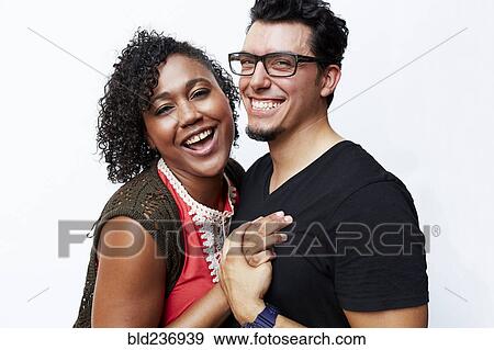 Stock Photo - Smiling couple hugging. Fotosearch