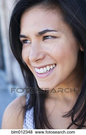 Stock Photo - Smiling mixed race woman. Fotosearch