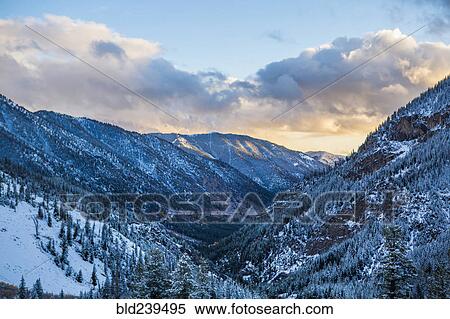 Snow in valley at sunset View Large Photo Image Stock Photography - Snow in valley at sunset. Fotosearch
