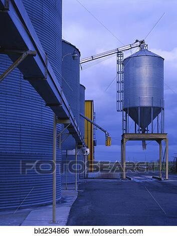 Storage silos at granary View Large Photo Image Stock Photograph - Storage silos at granary. Fotosearch