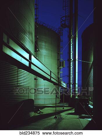 Storage silos at night View Large Photo Image Stock Photography - Storage silos at night. Fotosearch