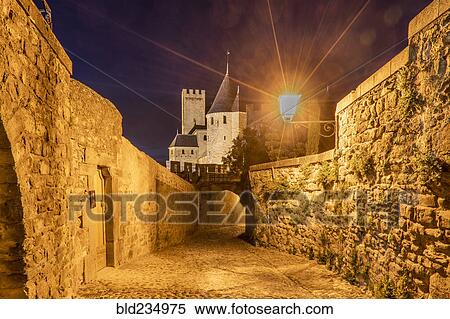 "Street lamp on walkway to castle in Carcassonne, Languedoc-Roussillon, France" View Large Photo Image Stock Photography - "Street lamp on walkway to castle in Carcassonne, Languedoc-Roussillon, France". Fotosearch