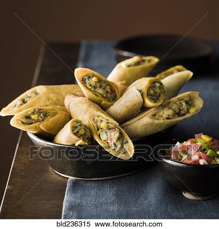 Stock Photography - Taquitos in bowl. Fotosearch