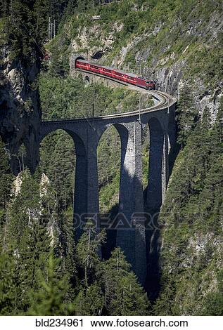 "Train on mountain bridge, Filisur, Canton Graubunden, Switzerland" View Large Photo Image Stock Image - "Train on mountain bridge, Filisur, Canton Graubunden, Switzerland". Fotosearch
