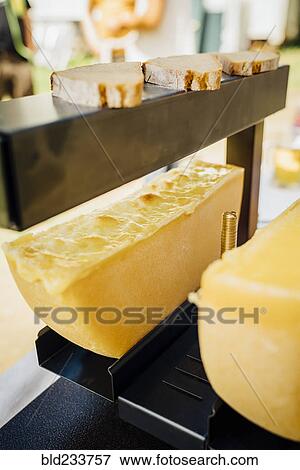 Wedges of cheese and sliced bread View Large Photo Image Stock Photo - Wedges of cheese and sliced bread. Fotosearch