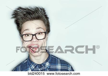Wind blowing face of Caucasian teenage boy View Large Photo Image Stock Photography - Wind blowing face of Caucasian teenage boy. Fotosearch