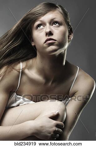 Stock Photo - Wind blowing long hair of Caucasian woman. Fotosearch