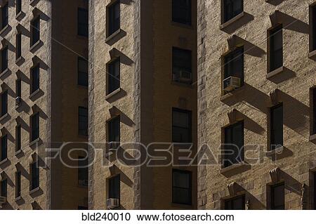 Stock Image - Windows of apartment buildings. Fotosearch