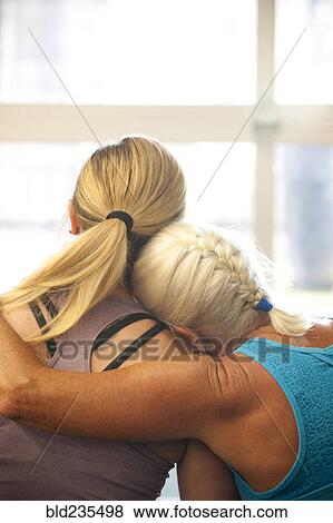 Women hugging View Large Photo Image Stock Photo - Women hugging. Fotosearch