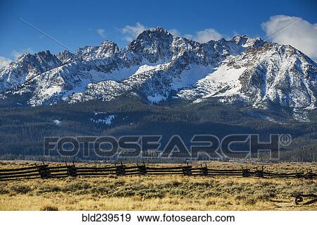 Wooden fence near snowy mountain View Large Photo Image Stock Photo - Wooden fence near snowy mountain. Fotosearch
