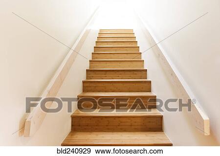 Stock Photo - Wooden staircase and railing. Fotosearch