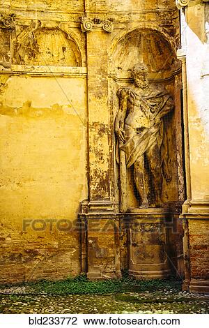 Worn statue in alcove View Large Photo Image Stock Image - Worn statue in alcove. Fotosearch