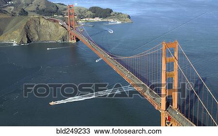 Stock Image - Aerial view of boats under bridge. Fotosearch