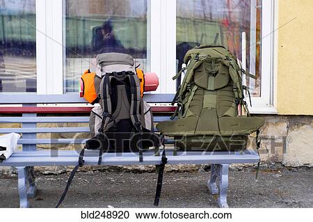 Backpacks on bench View Large Photo Image Stock Image - Backpacks on bench. Fotosearch