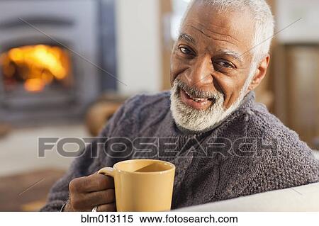 Black man drinking coffee View Large Photo Image Stock Photography - Black man drinking coffee. Fotosearch