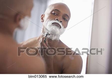Black man shaving View Large Photo Image Stock Photography - Black man shaving. Fotosearch