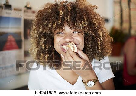 Black woman biting sandwich View Large Photo Image Stock Photograph - Black woman biting sandwich. Fotosearch