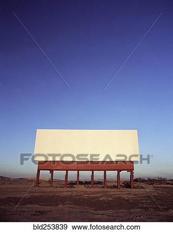 Stock Photo - Blank billboard in remote landscape. Fotosearch