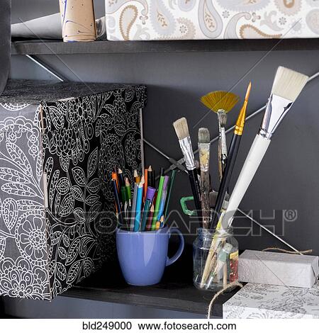 Boxes and art supplies on shelves View Large Photo Image Stock Image - Boxes and art supplies on shelves. Fotosearch