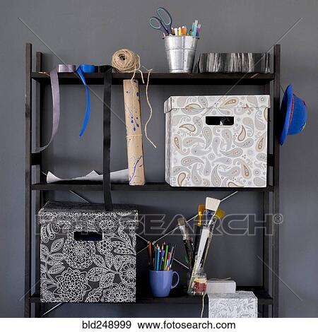 Boxes and art supplies on shelves View Large Photo Image Stock Photo - Boxes and art supplies on shelves. Fotosearch