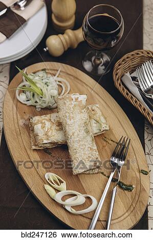 Bread and onions on tray View Large Photo Image Stock Photograph - Bread and onions on tray. Fotosearch