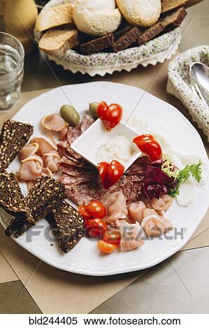 "Bread, meat and tomatoes on plate" View Large Photo Image Stock Photography - "Bread, meat and tomatoes on plate". Fotosearch