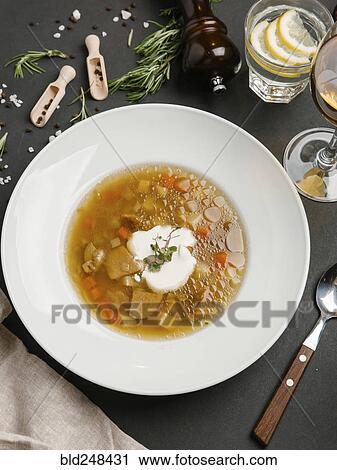 Brown soup in bowl with sour cream View Large Photo Image Stock Image - Brown soup in bowl with sour cream. Fotosearch