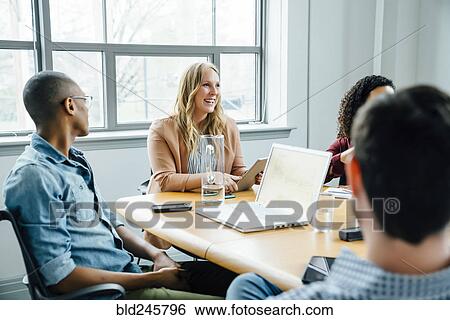 Business people in meeting View Large Photo Image Stock Photograph - Business people in meeting. Fotosearch