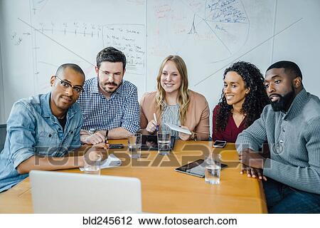Stock Image - Business people on video conference. Fotosearch