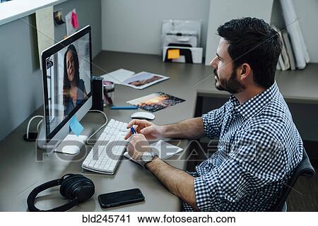Business people on video conference View Large Photo Image Stock Image - Business people on video conference. Fotosearch