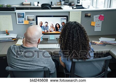 Stock Photo - Business people on video conference. Fotosearch