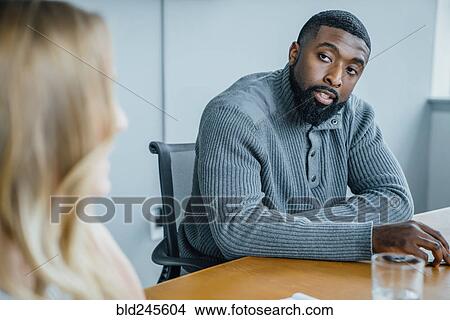 Business people talking in meeting View Large Photo Image Picture - Business people talking in meeting. Fotosearch