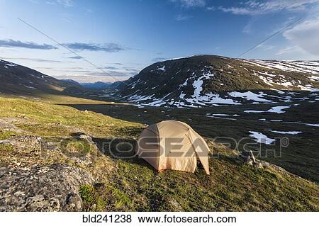 Camping tent in remote landscape View Large Photo Image Stock Photo - Camping tent in remote landscape. Fotosearch