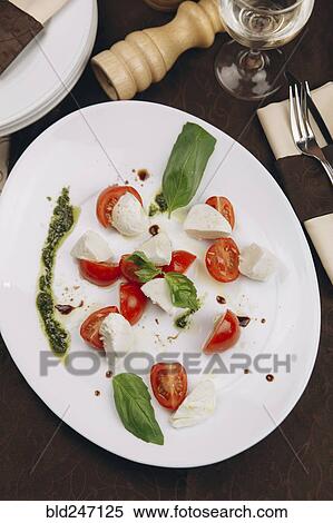 Caprese salad on plate View Large Photo Image Stock Photography - Caprese salad on plate. Fotosearch