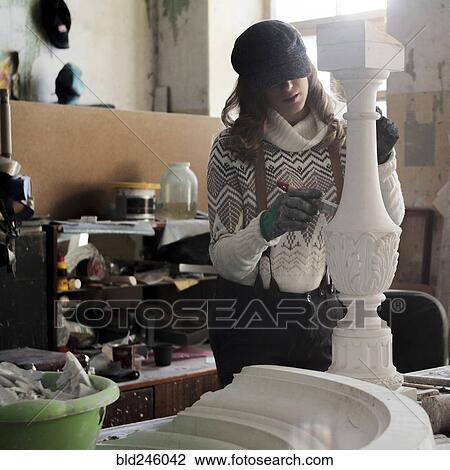 Caucasian artist sculpting with tool View Large Photo Image Stock Image - Caucasian artist sculpting with tool. Fotosearch