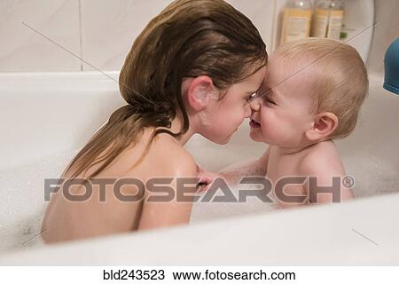 Caucasian brother and sister rubbing noses in bubble bath View Large Photo Image Stock Image - Caucasian brother and sister rubbing noses in bubble bath. Fotosearch