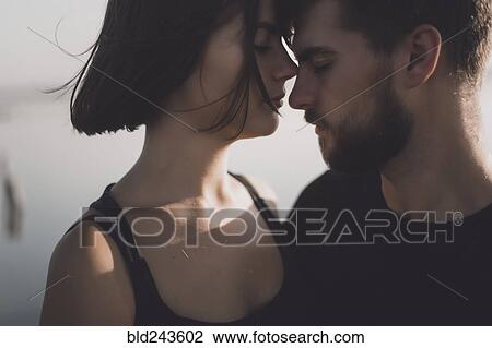 Caucasian couple face to face with eyes closed View Large Photo Image Stock Image - Caucasian couple face to face with eyes closed. Fotosearch
