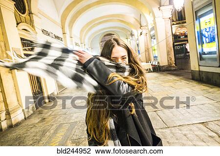 Caucasian couple tossing scarf in lobby View Large Photo Image Stock Image - Caucasian couple tossing scarf in lobby. Fotosearch