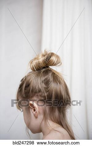 Stock Photo - Caucasian girl with hair up. Fotosearch
