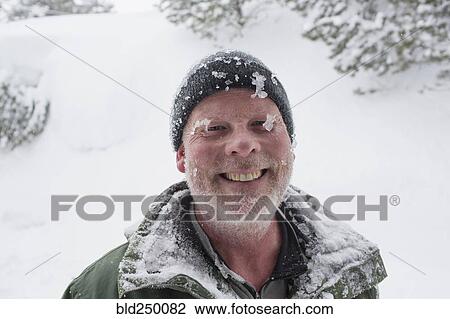 Caucasian man covered with ice and snow View Large Photo Image Stock Image - Caucasian man covered with ice and snow. Fotosearch