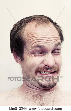 Picture - Caucasian man crying. Fotosearch