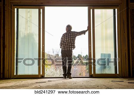 Caucasian man leaning in doorway View Large Photo Image Stock Photo - Caucasian man leaning in doorway. Fotosearch