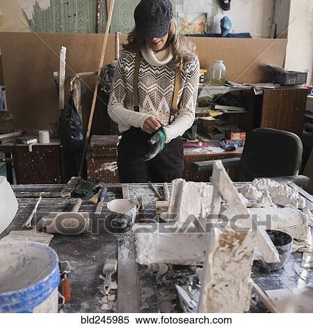 Caucasian sculptor preparing with glove View Large Photo Image Stock Photography - Caucasian sculptor preparing with glove. Fotosearch