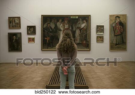 Caucasian teenage girl admiring paintings in museum View Large Photo Image Stock Image - Caucasian teenage girl admiring paintings in museum. Fotosearch