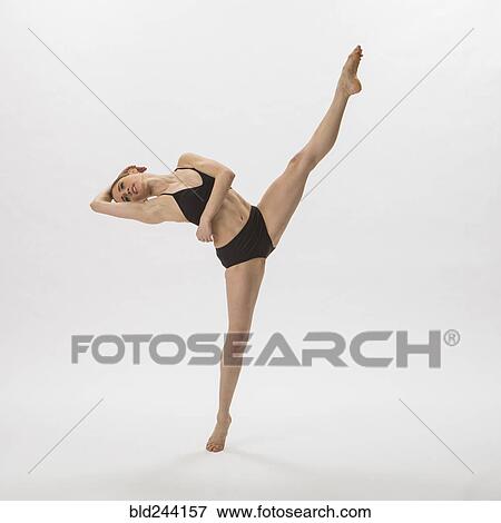 Caucasian woman ballet dancing in underwear View Large Photo Image Stock Photo - Caucasian woman ballet dancing in underwear. Fotosearch