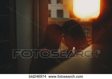 Picture - Caucasian woman caressing face of man. Fotosearch
