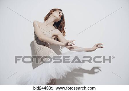 Caucasian woman dancing wearing tutu View Large Photo Image Stock Photography - Caucasian woman dancing wearing tutu. Fotosearch