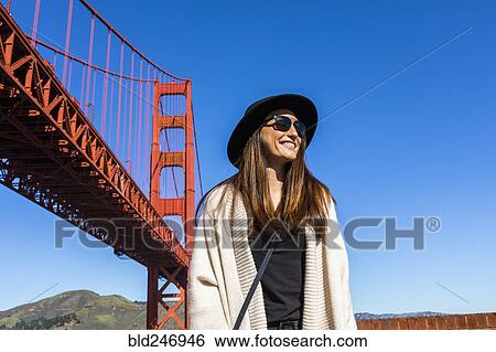 Stock Photograph - "Caucasian woman near Golden Gate Bridge, San Francisco, California, United States". Fotosearch